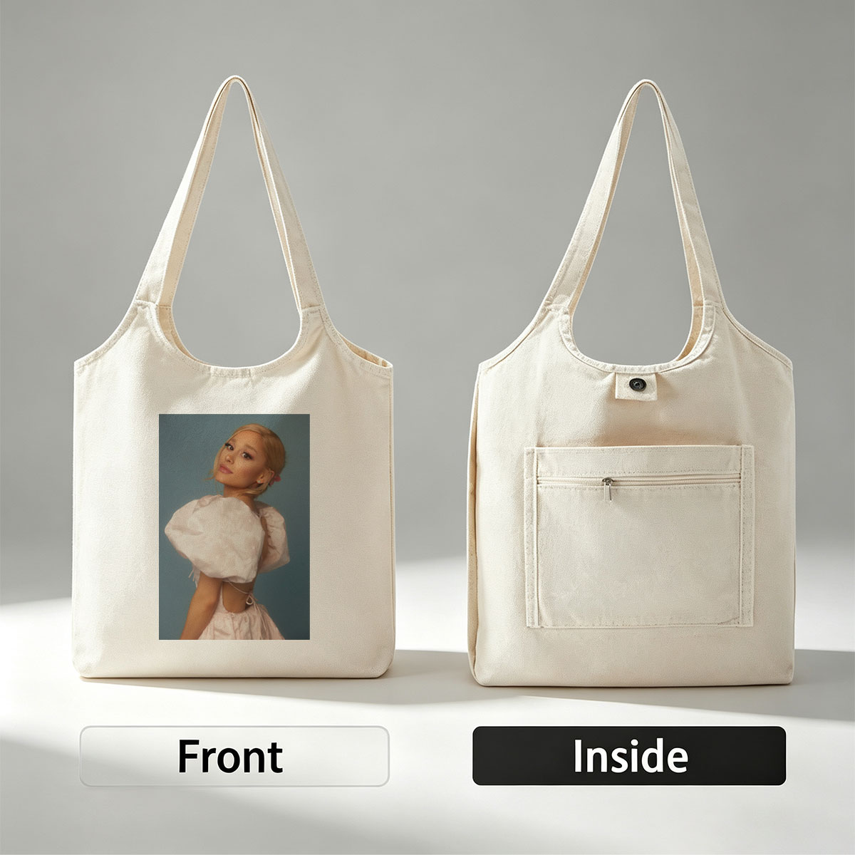 Ariana Grande in a Soft Pink Dress with Puffy Sleeves and Back Cutout Pose Against Blue Background - Canvas shoulder bags/