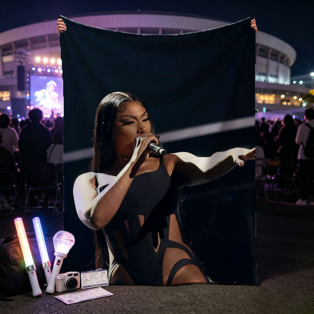 Cardi B Performing on Stage in a Black Bodysuit Holding a Microphone - Blankets
