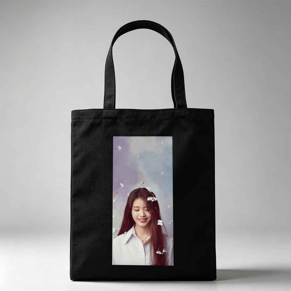 IU in a Dreamy Floral Scene with White Flowers Floating Around Her - Canvas tote bags