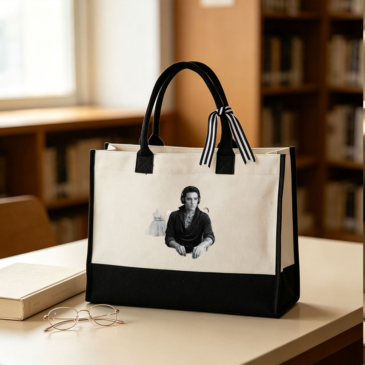 Elvis Presley as a DJ with tattoos, wearing headphones, in a black suit, with a woman in a vintage dress in the background. - Canvas patchwork gift tote bag