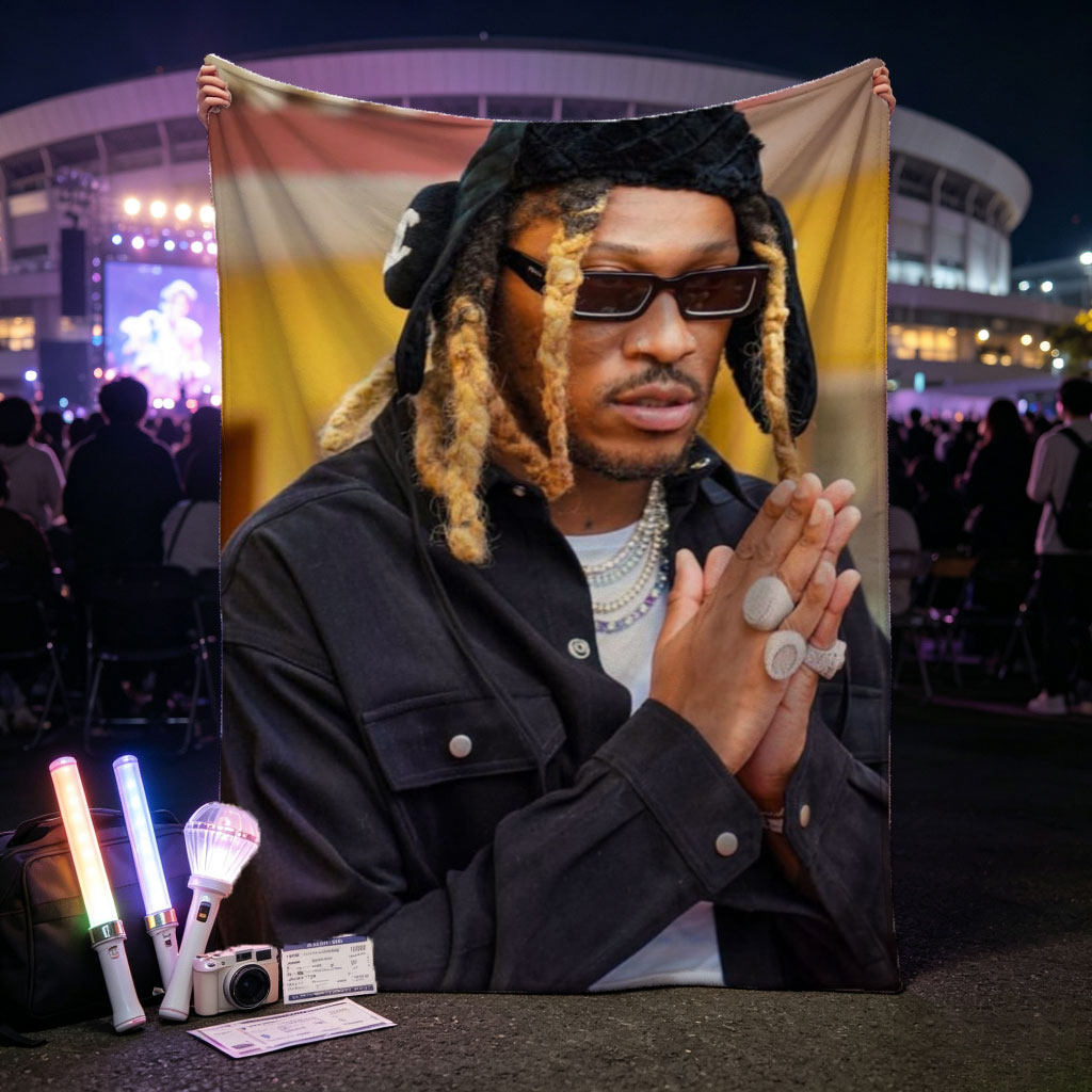 Wiz Khalifa in a stylish urban look with dreadlocks, sunglasses, and layered jewelry, hands clasped in front of a colorful building. - Blankets