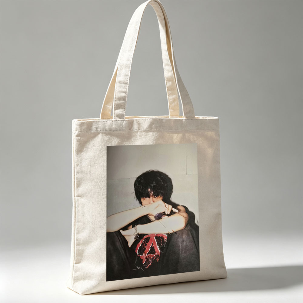 Hyunjin of Stray Kids in a Moody Pose with Sunglasses and Cross Tattoo, Wearing a Black T-Shirt with Red Peace Symbol Design - Canvas tote bags