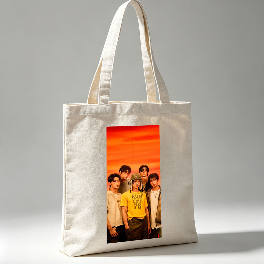 TXT Members in a Bold Group Pose Against a Vibrant Orange Sky Background - Canvas tote bags