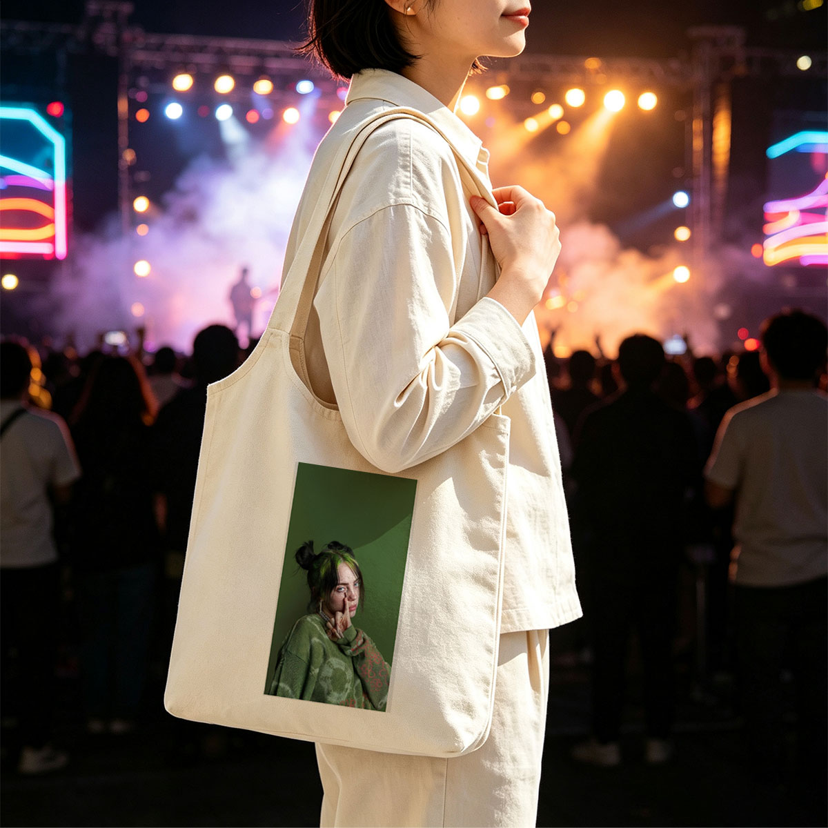 Billie Eilish in Studio Portrait Wearing Green Knit Sweater with Hair in Buns and Fingers on Face - Canvas shoulder bags/