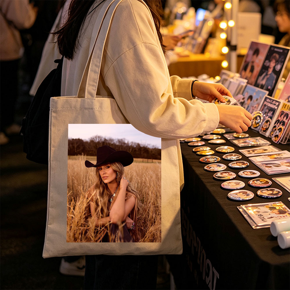 Paris Hilton in a Field of Golden Grass Wearing a Black Cowboy Hat and Boho Outfit - Canvas tote bags