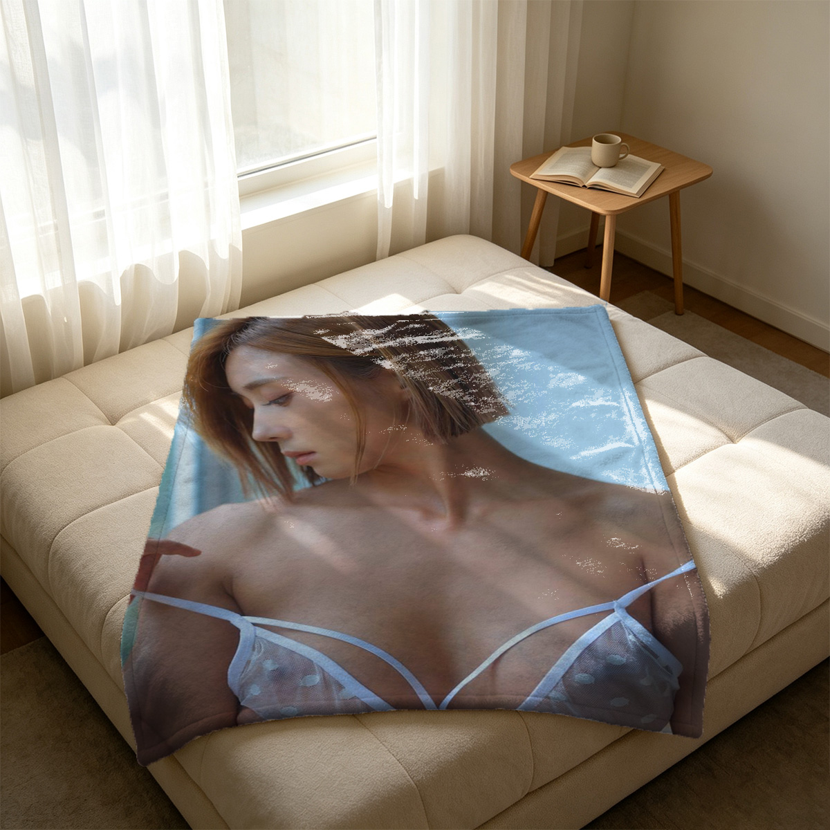 A topless woman with a blue headscarf sitting among tea bushes in a field. - Blanket