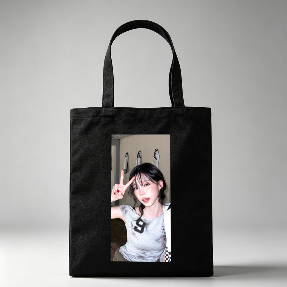 Korean Celebrity in Casual Outfit Making Peace Sign in Indoor Setting - Canvas tote bags