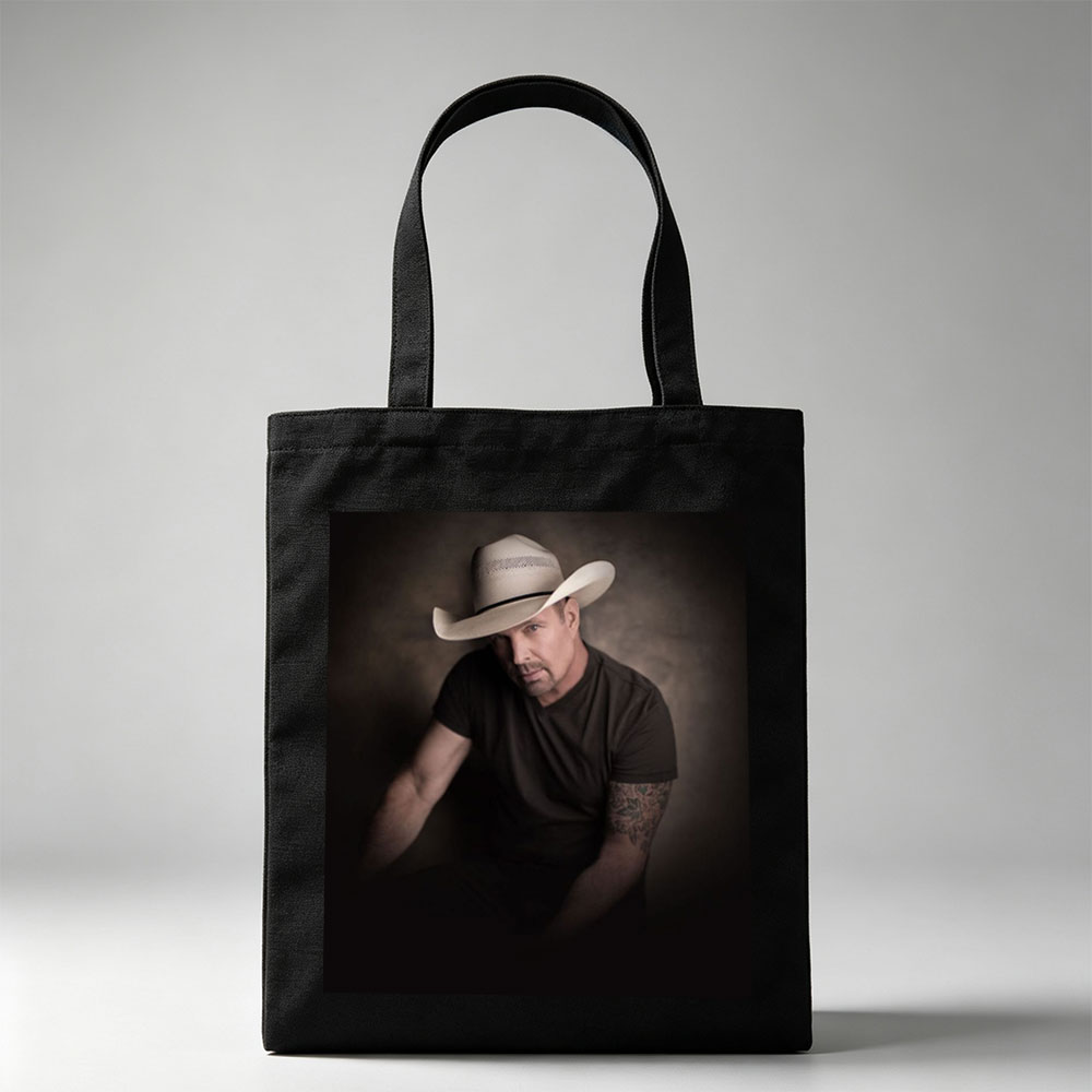 Tim McGraw in a Cowboy Hat - Intense Portrait with Tattooed Arm and Dark Background - Canvas tote bags