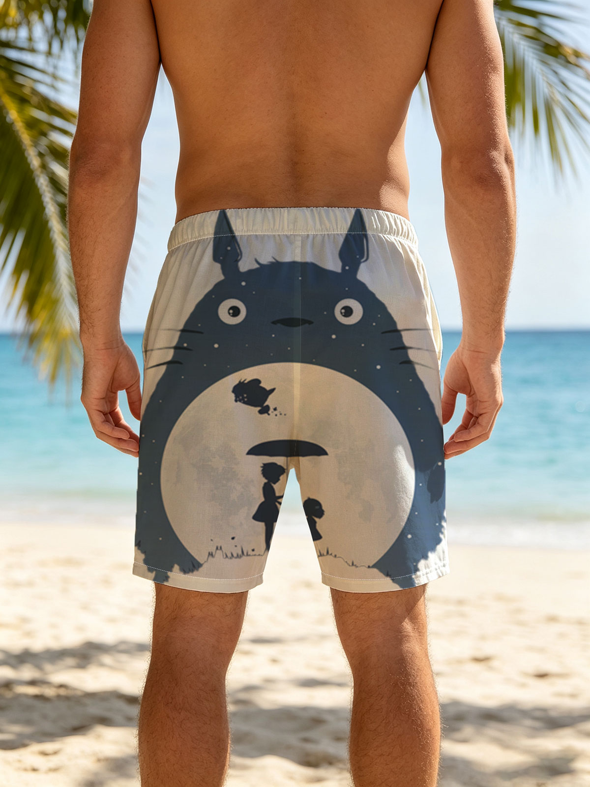 Totoro, Satsuki, and Mei under the Moonlight -  Beach shorts