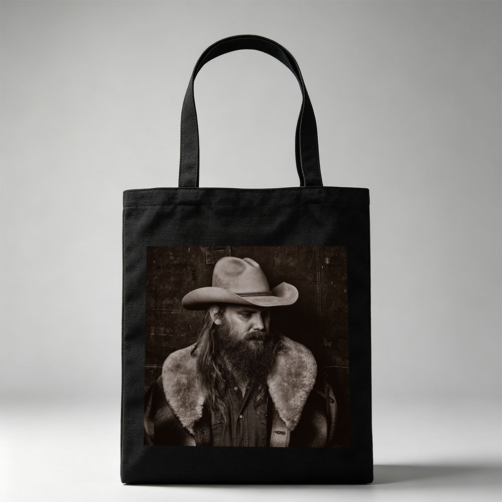 Chris Stapleton in a Cowboy Hat and Fur-Collared Jacket, Gazing Thoughtfully in a Monochrome Portrait - Canvas tote bags