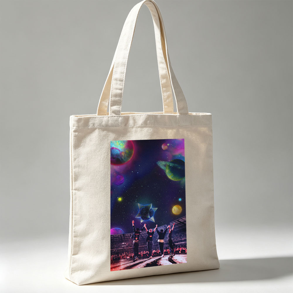 Coldplay Live Performance in a Cosmic Stadium with Vibrant Planets and Starry Sky Background - Canvas tote bags