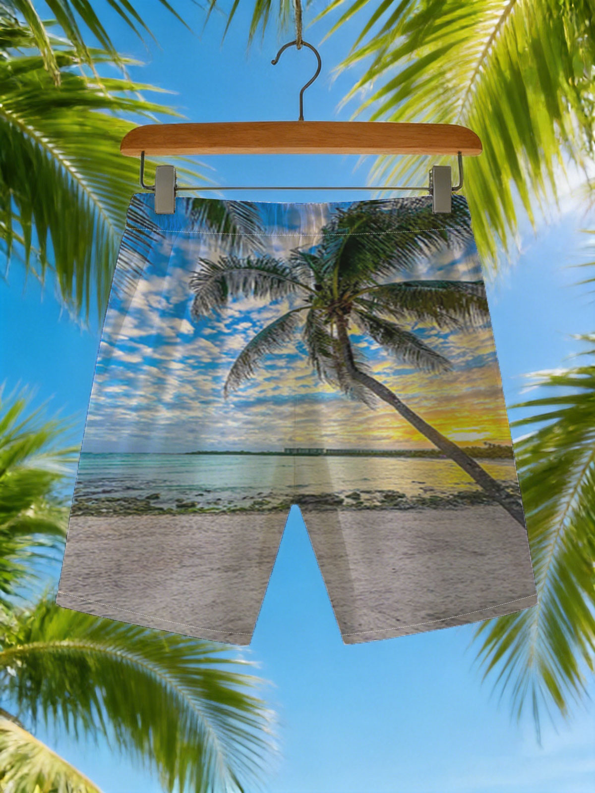 Tropical beach at sunset with palm tree and calm sea -  Beach shorts
