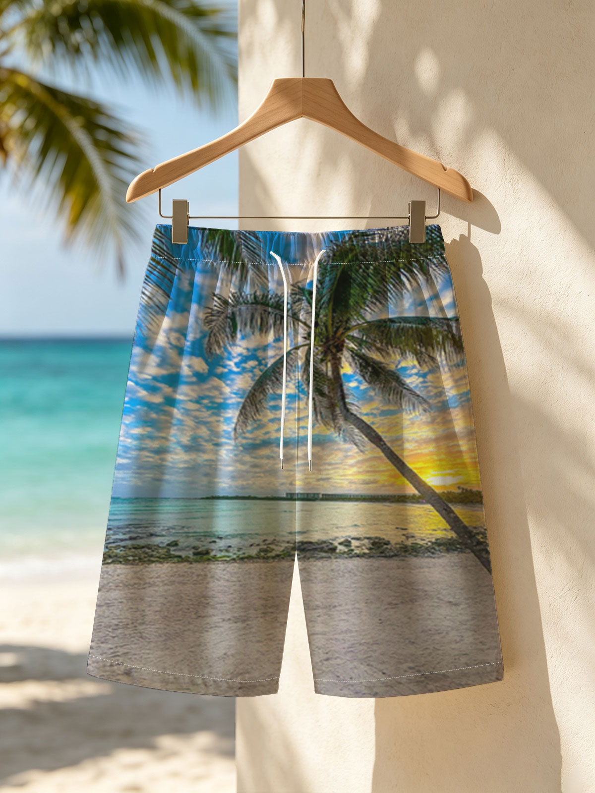 Tropical beach at sunset with palm tree and calm sea -  Beach shorts