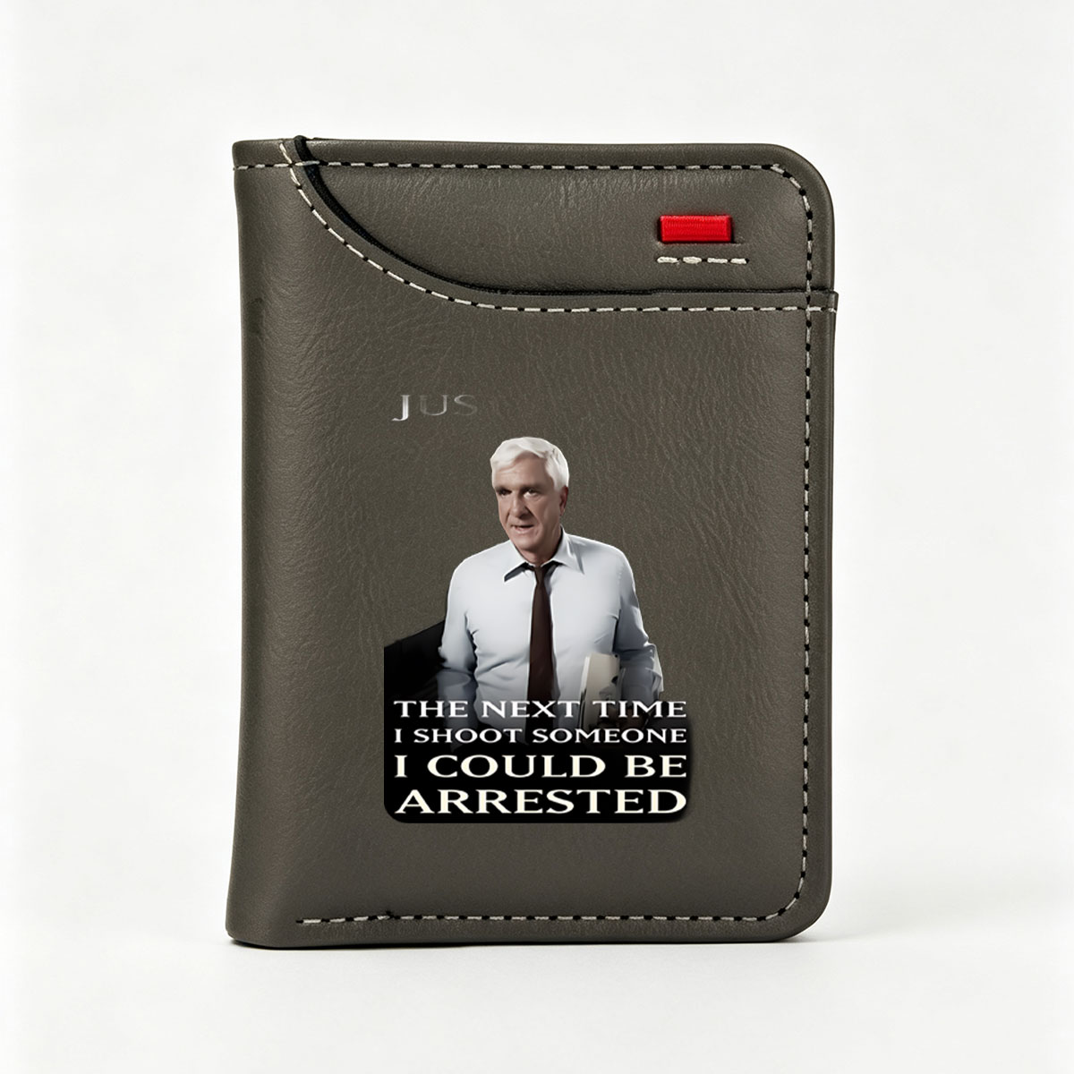 Alex Trebek in a White Shirt and Tie Holding a Folder with Text 