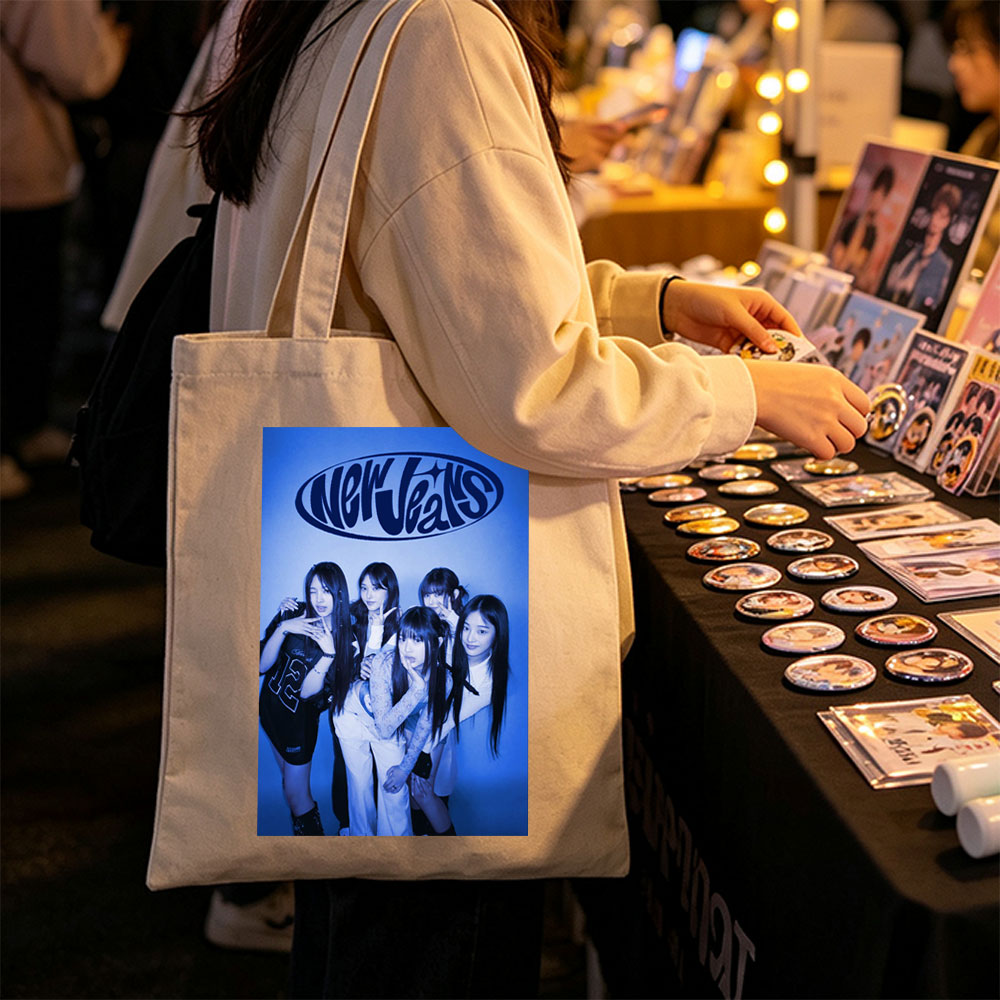 NewJeans Group Pose in Blue-Toned Studio Photo with Stylish Outfits and Confident Expressions - Canvas tote bags