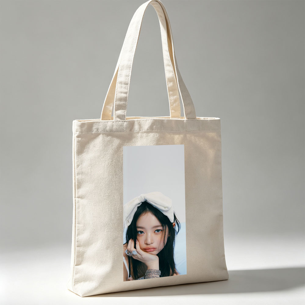 Hanni of NewJeans in a Soft Portrait with White Bow Headband and Elegant Jewelry - Canvas tote bags