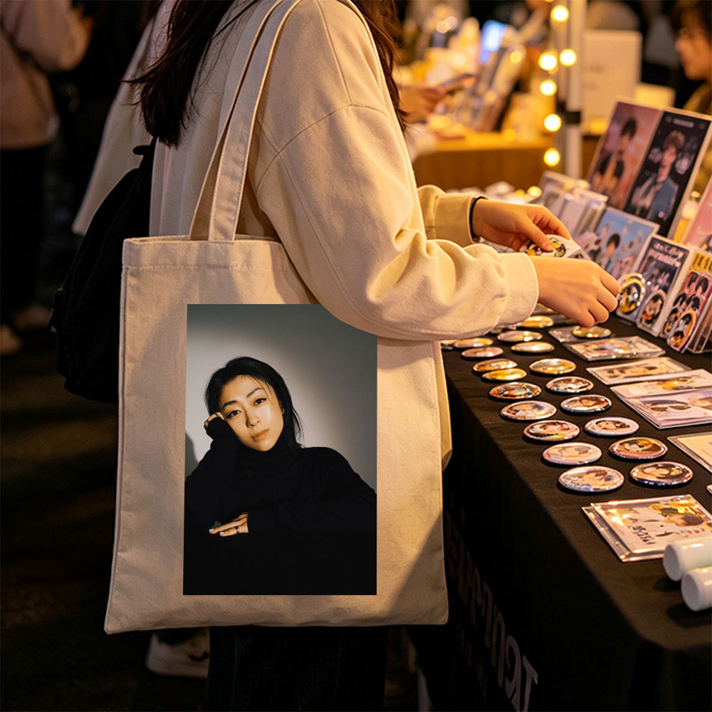 Yoko Kanno in a Moody Portrait Wearing Black Turtleneck with Dramatic Lighting - Canvas tote bags