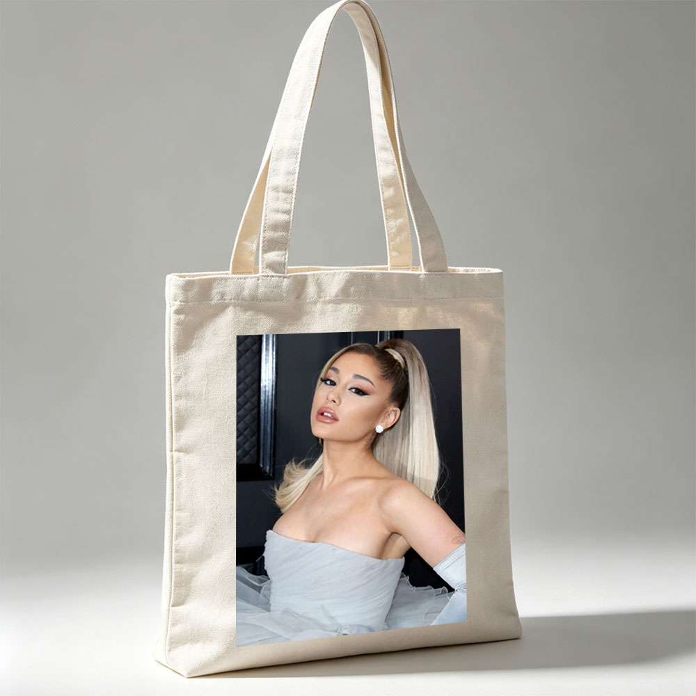 Ariana Grande at a Red Carpet Event Wearing a Light Blue Strapless Gown with Tulle Skirt and High Ponytail Hairstyle - Canvas tote bags