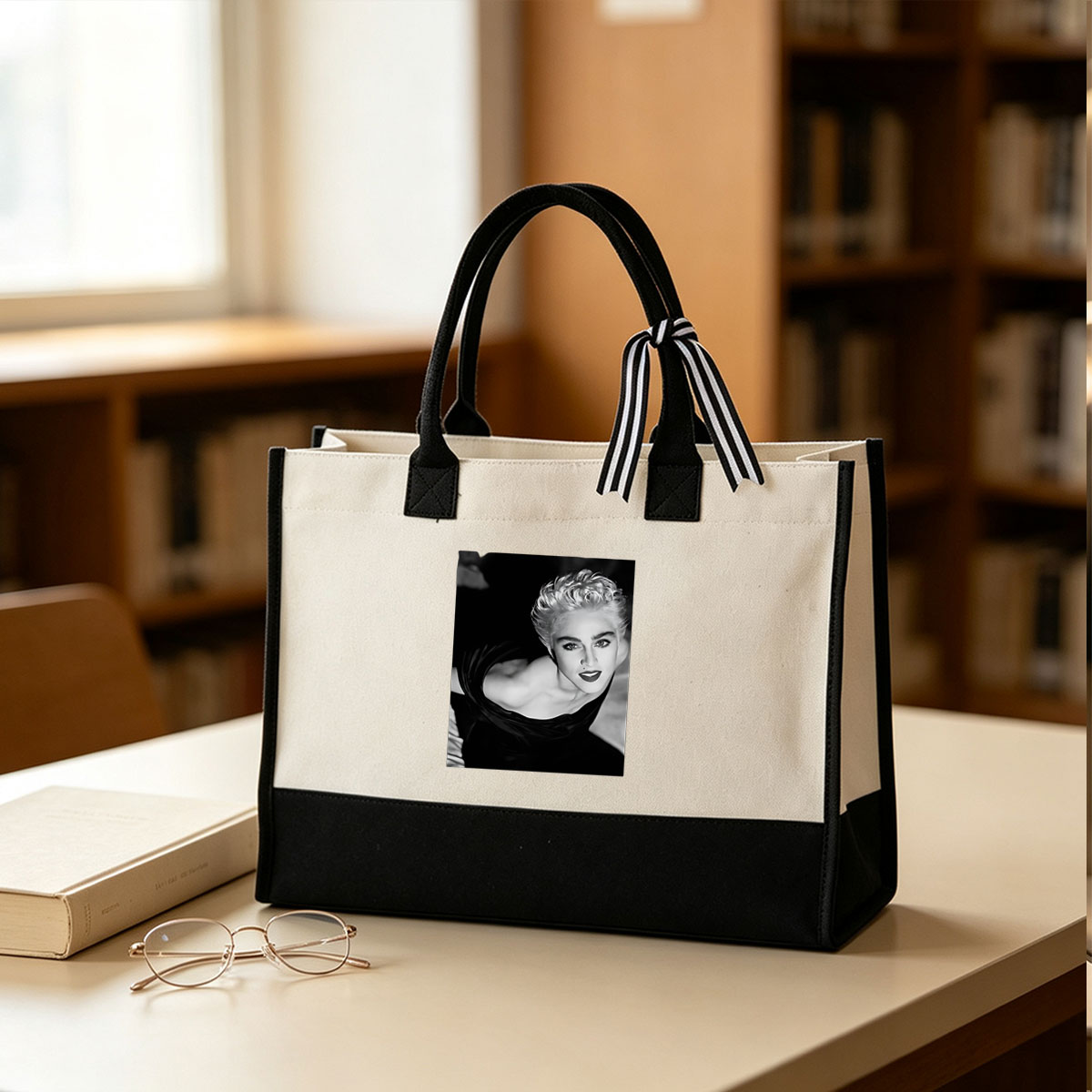 Madonna in a striking black and white portrait, showcasing bold makeup and voluminous blonde hair. - Canvas patchwork gift tote bag