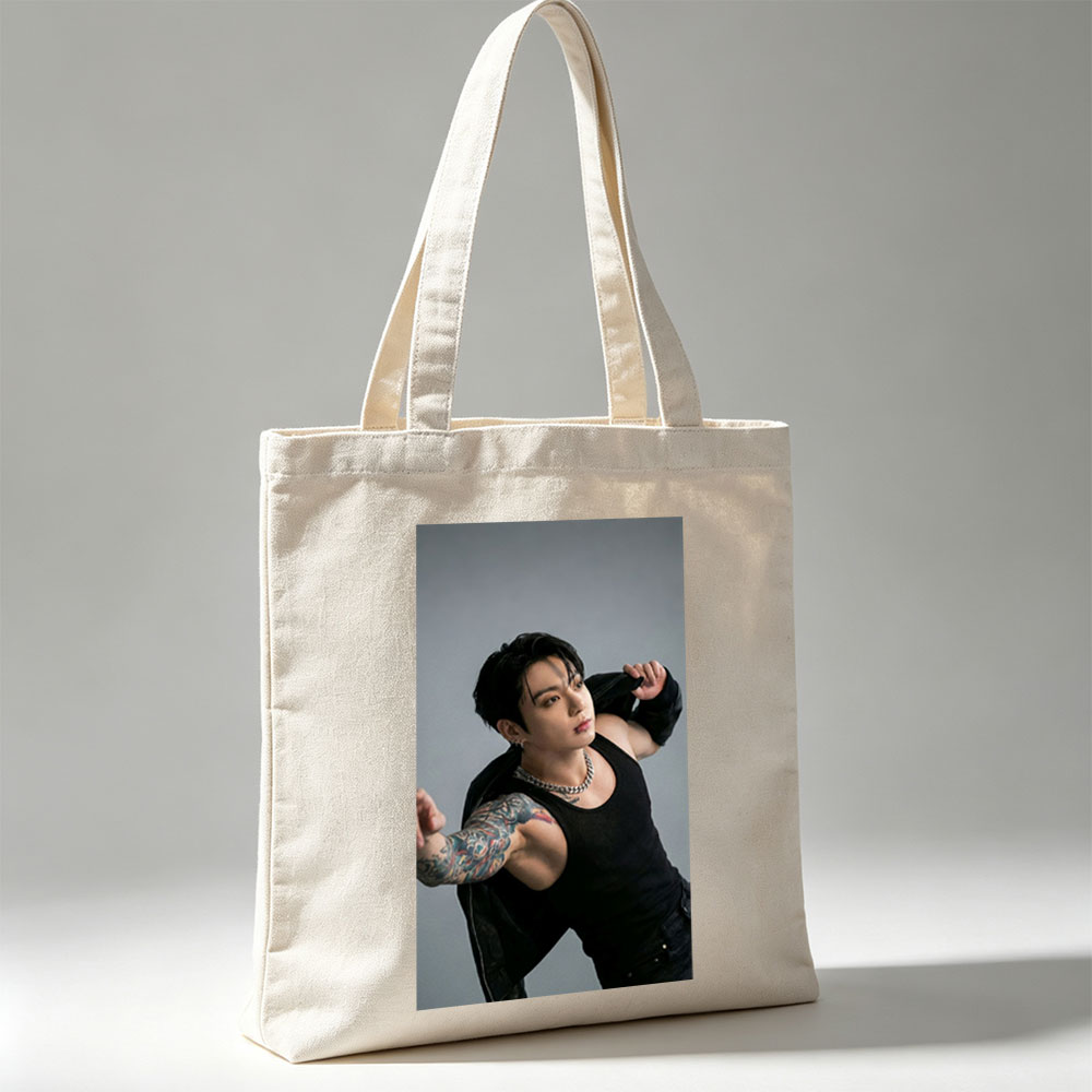 BTS Jungkook in a Powerful Pose with Tattooed Arm and Black Tank Top - Canvas tote bags