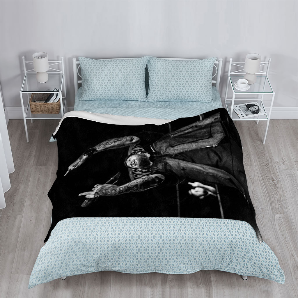 Luke Combs Performing on Stage with Tattooed Arms Raised in Black and White Photo - Blankets