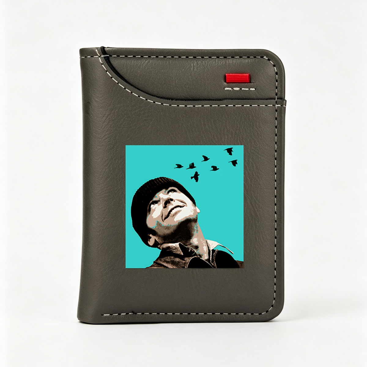 Man in Beanie Gazing at Flying Birds Against Teal Sky - Vertical Style Wallet