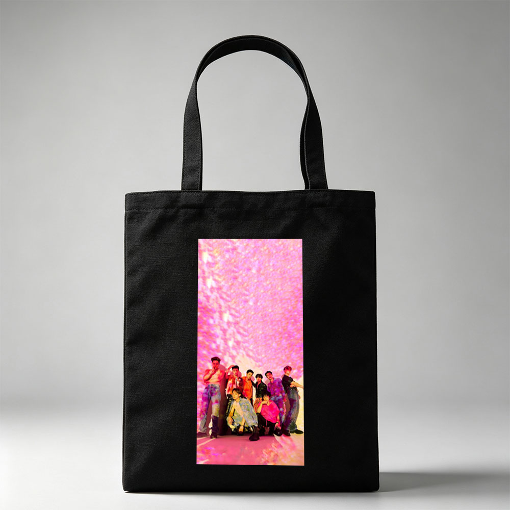 SEVENTEEN in a vibrant pink-lit scene with dynamic poses and colorful outfits - Canvas tote bags