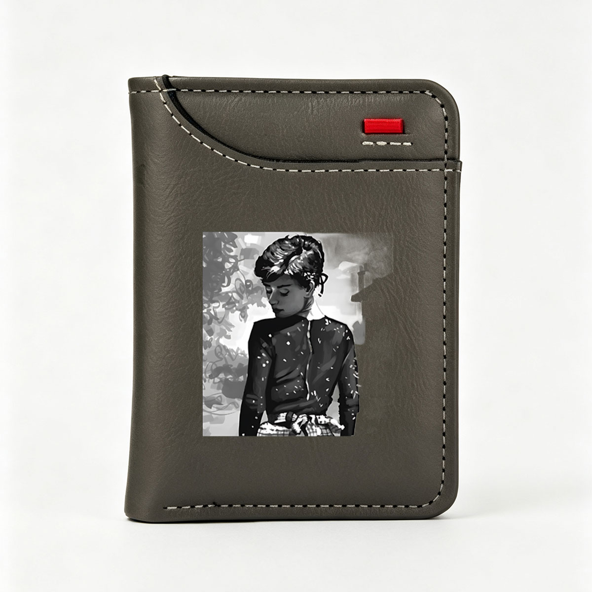 Audrey Hepburn in a contemplative moment, classic black and white portrait - Vertical Style Wallet