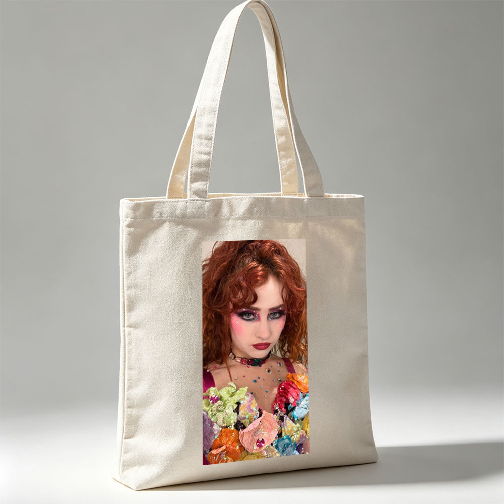 Chloe Lukasiak in a Vibrant Fashion Scene Featuring Colorful Floral Outfit and Dramatic Makeup - Canvas tote bags
