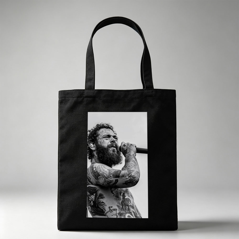 Post Malone Performing on Stage with Tattooed Arms and Beard in Black and White Photo - Canvas tote bags