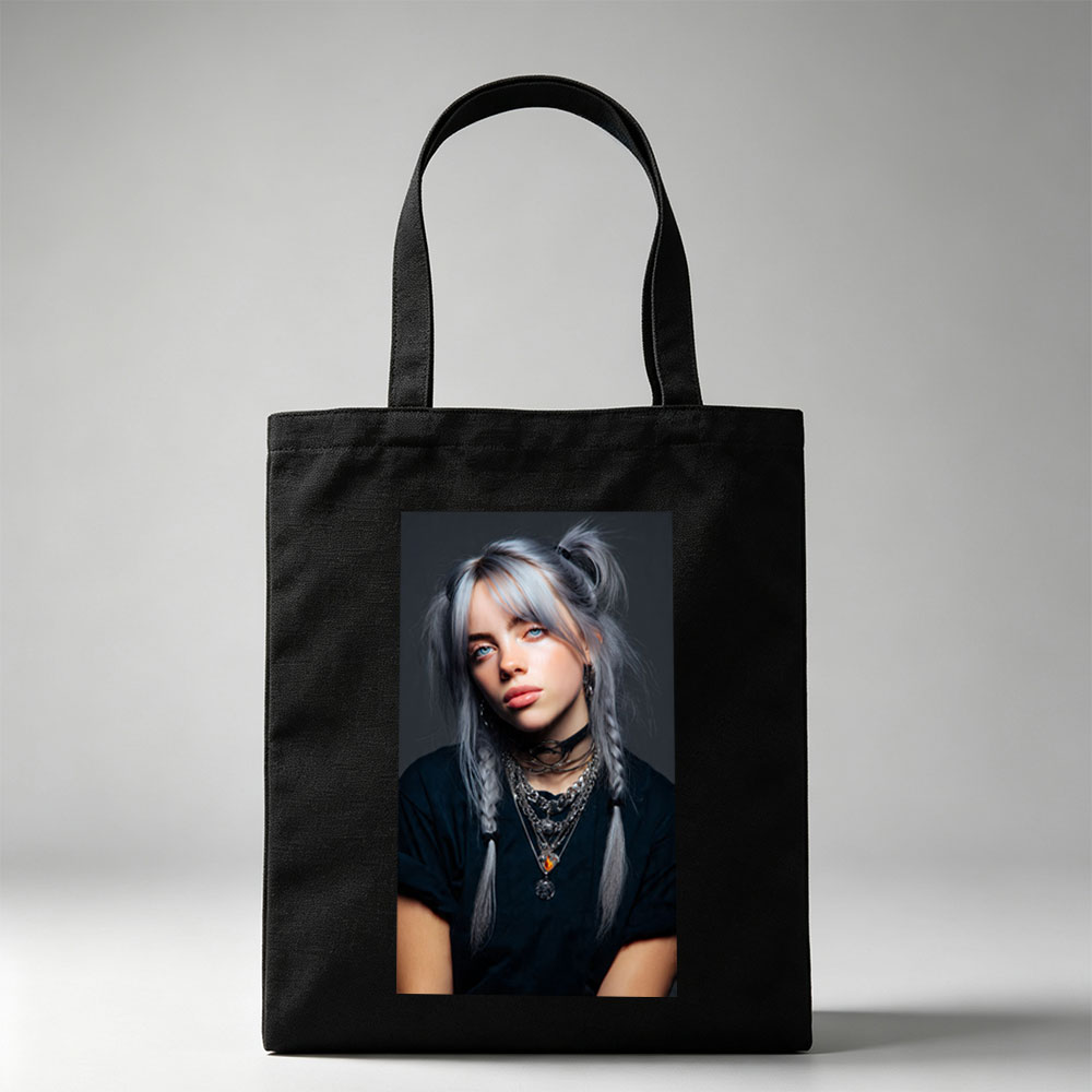 Billie Eilish in a striking portrait with silver hair styled in braids, wearing layered necklaces and a black top against a dark background. - Canvas tote bags