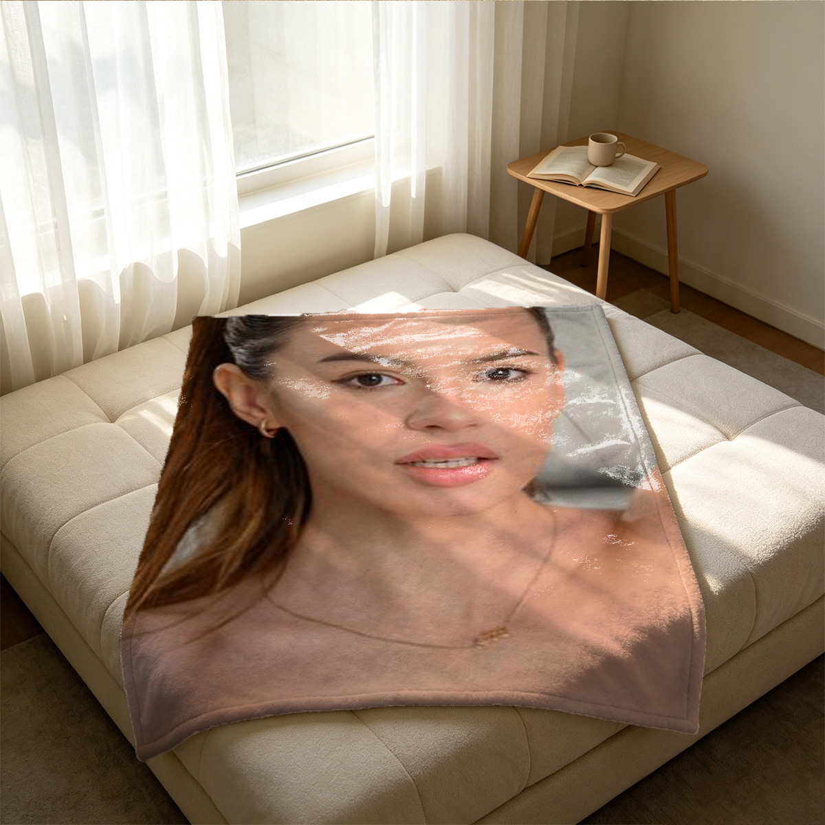 A woman in black lingerie and stockings kneeling on a white sofa. - Blanket