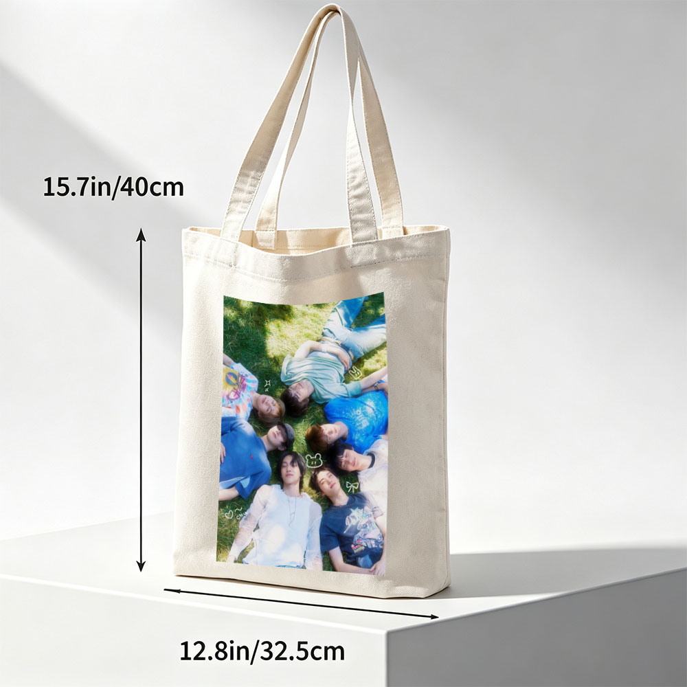 ENHYPEN Lying on Grass in a Circle with Playful Expressions and Cute Emojis - Canvas tote bags