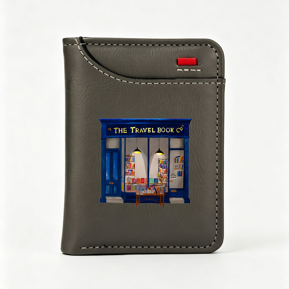 The Travel Book Co: A Cozy Bookstore with Colorful Shelves and Open Sign - Vertical Style Wallet