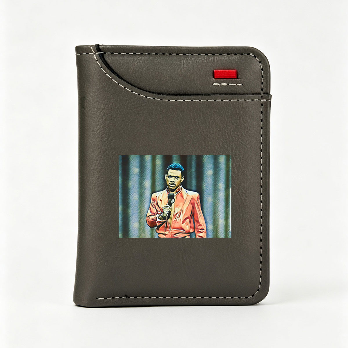 Eddie Murphy in a vibrant orange jacket holding a microphone on stage - Vertical Style Wallet