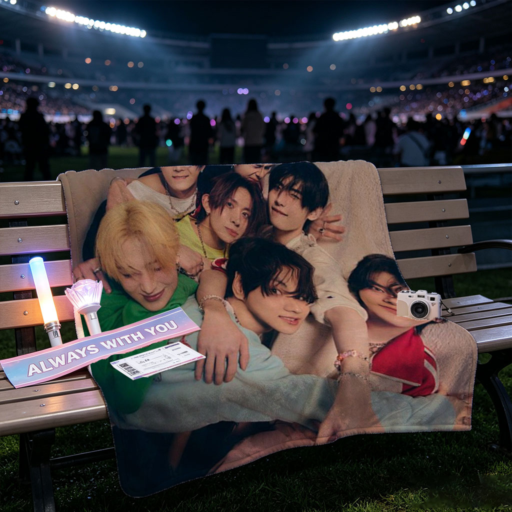 ENHYPEN Group Photo - Close-Up of Members Posing Together in a Cozy Indoor Setting - Blankets
