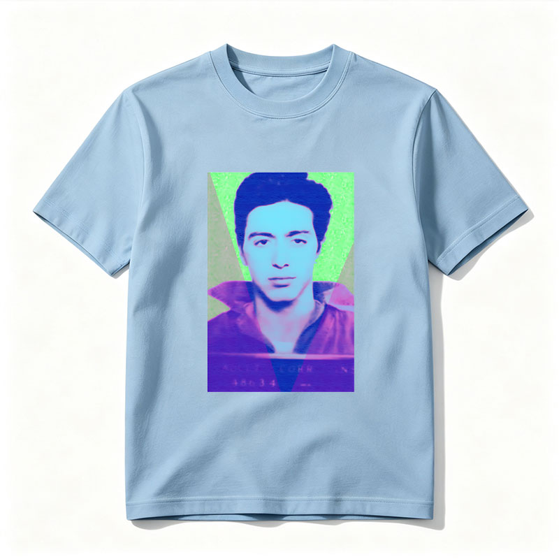 A stylized portrait of a man with vibrant, colorful lighting and geometric overlays. - Tee