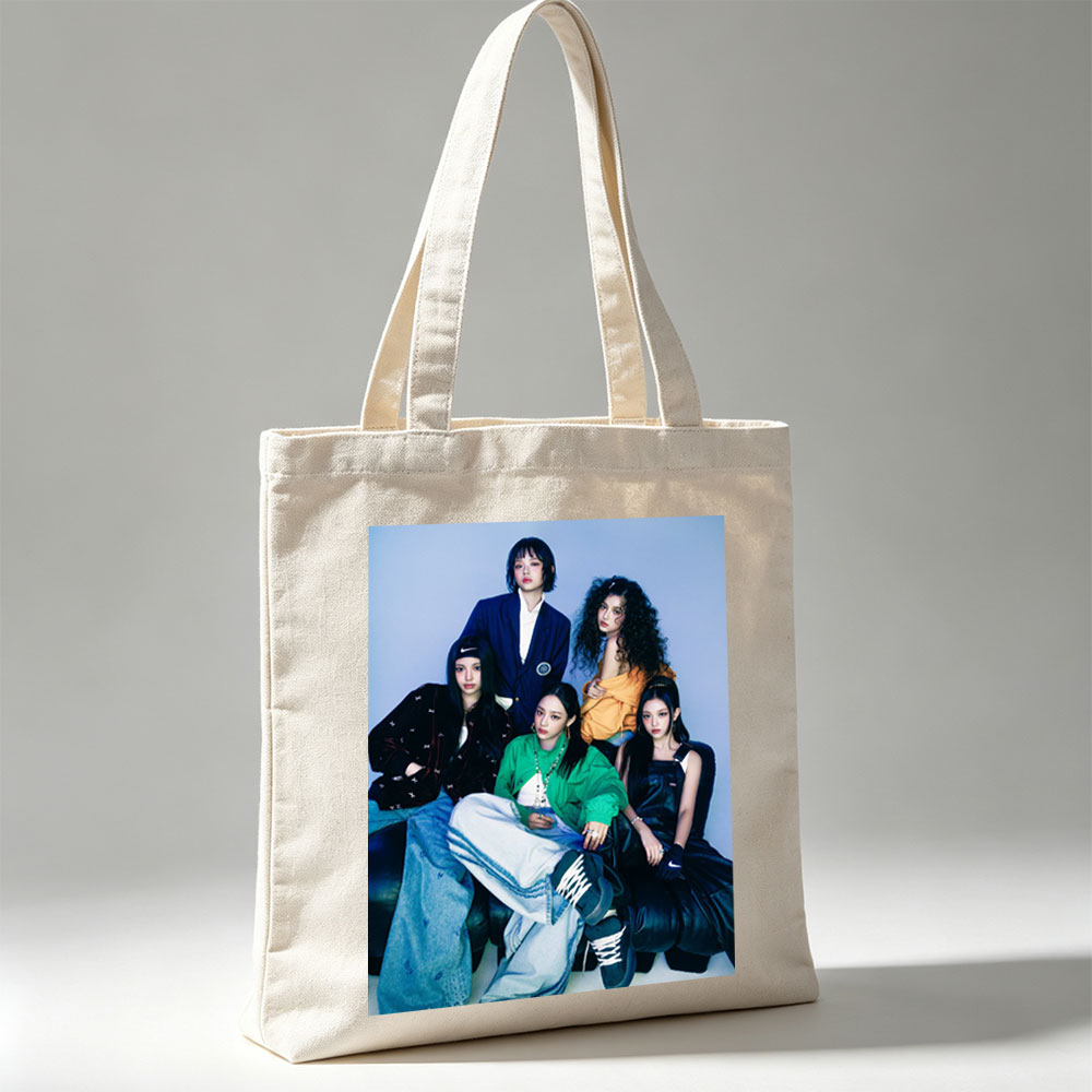 NewJeans Group Photo - Five Members in Stylish Outfits Posed Against a Blue Background - Canvas tote bags
