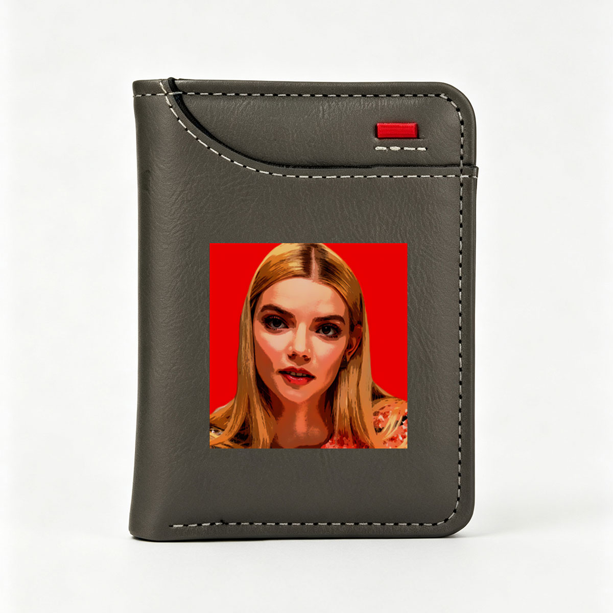 Anya Taylor-Joy in a stylized portrait with bold red background - Vertical Style Wallet