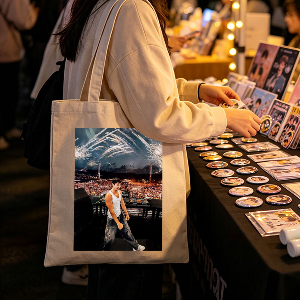 Martin Garrix Live Performance at Festival with Fireworks and Crowd in Background - Canvas tote bags