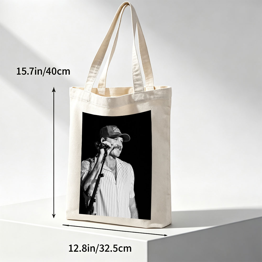 Ronnie Milsap Performing on Stage with Microphone in Black and White Photo - Canvas tote bags