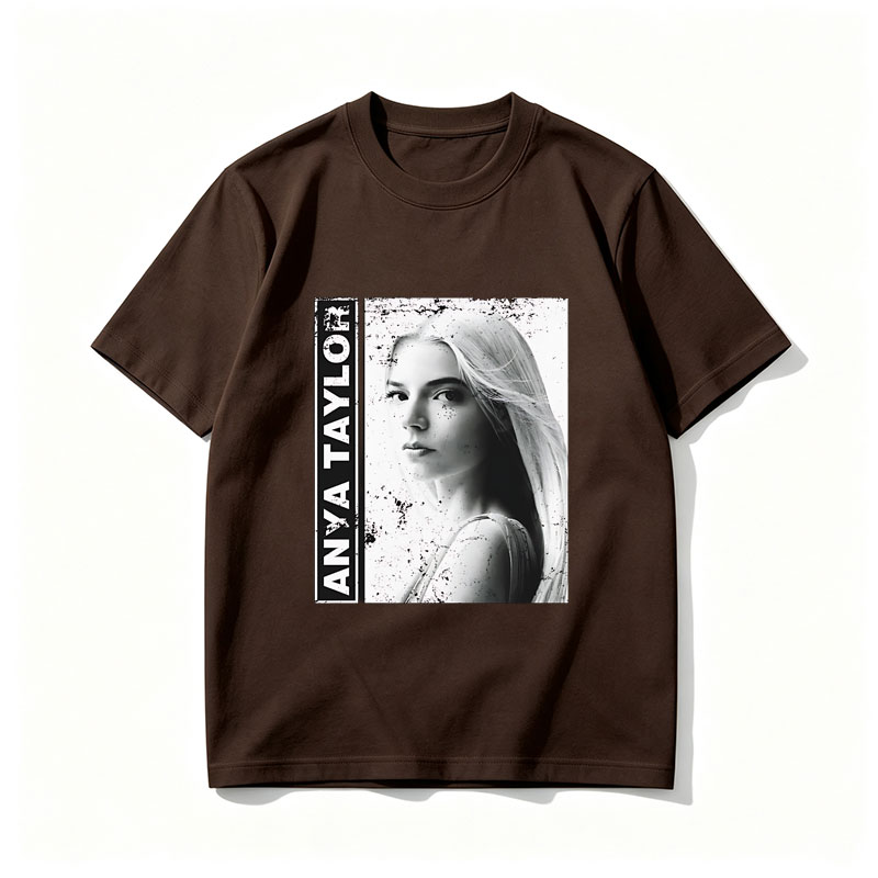 Anya Taylor-Joy in a striking black and white portrait with artistic splatter effects. - Tee