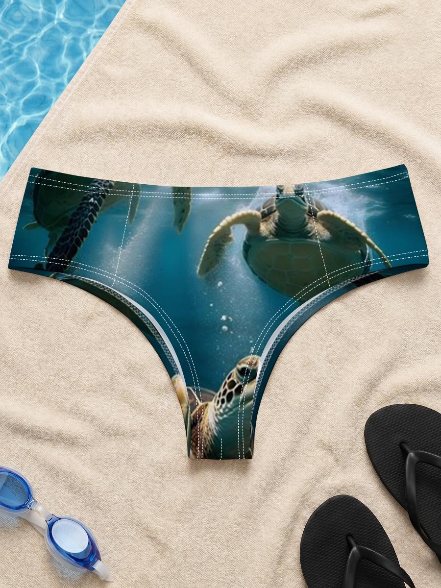 Three sea turtles swimming gracefully underwater in clear blue ocean. -  Men's swim trunks