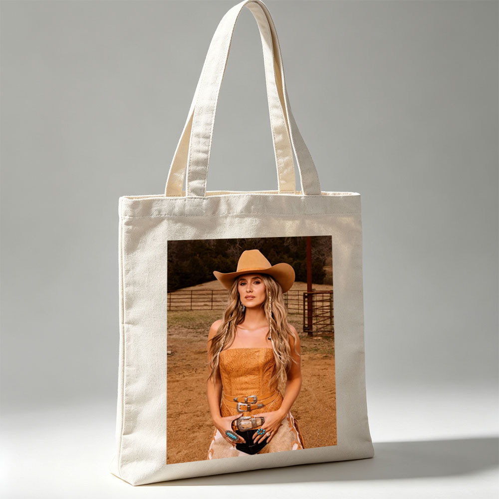 Paris Hilton in Cowboy Chic: Wearing a Tan Hat and Embroidered Corset Outfit on a Ranch - Canvas tote bags