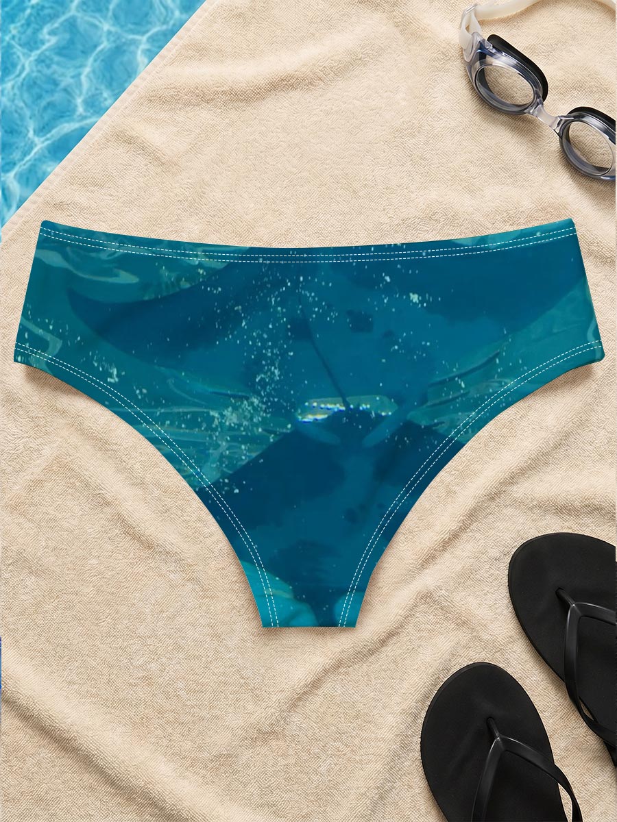 Graceful manta rays glide through clear blue waters, their silhouettes dancing beneath the surface. -  Men's swim trunks