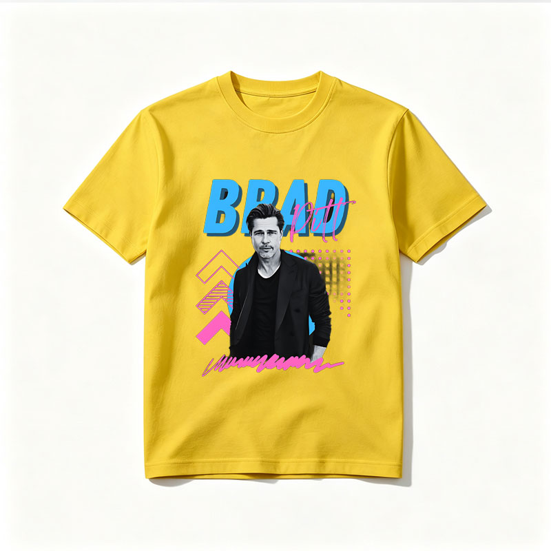 Brad Pitt in a stylish black suit against a vibrant graphic background with bold text and geometric patterns. - Tee