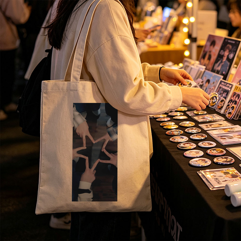 BTS Members Forming a Star with Their Hands on Wooden Floor - Canvas tote bags