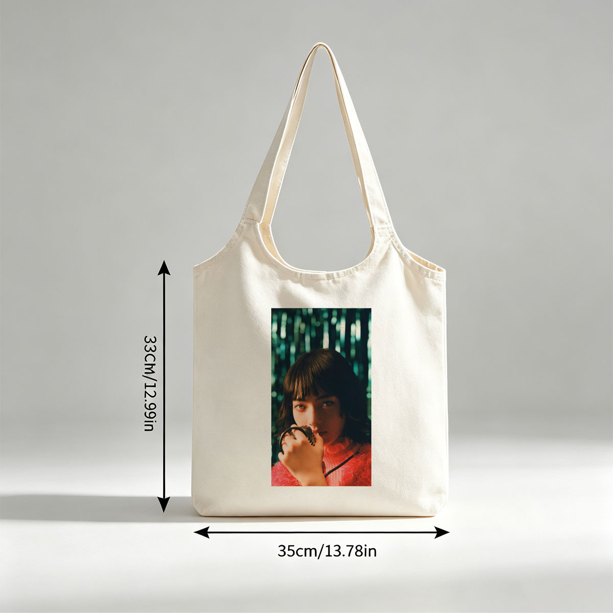 Smallville Actress Allison Mack in a Striking Red Outfit Holding a Microphone Against a Glittering Background - Canvas shoulder bags/