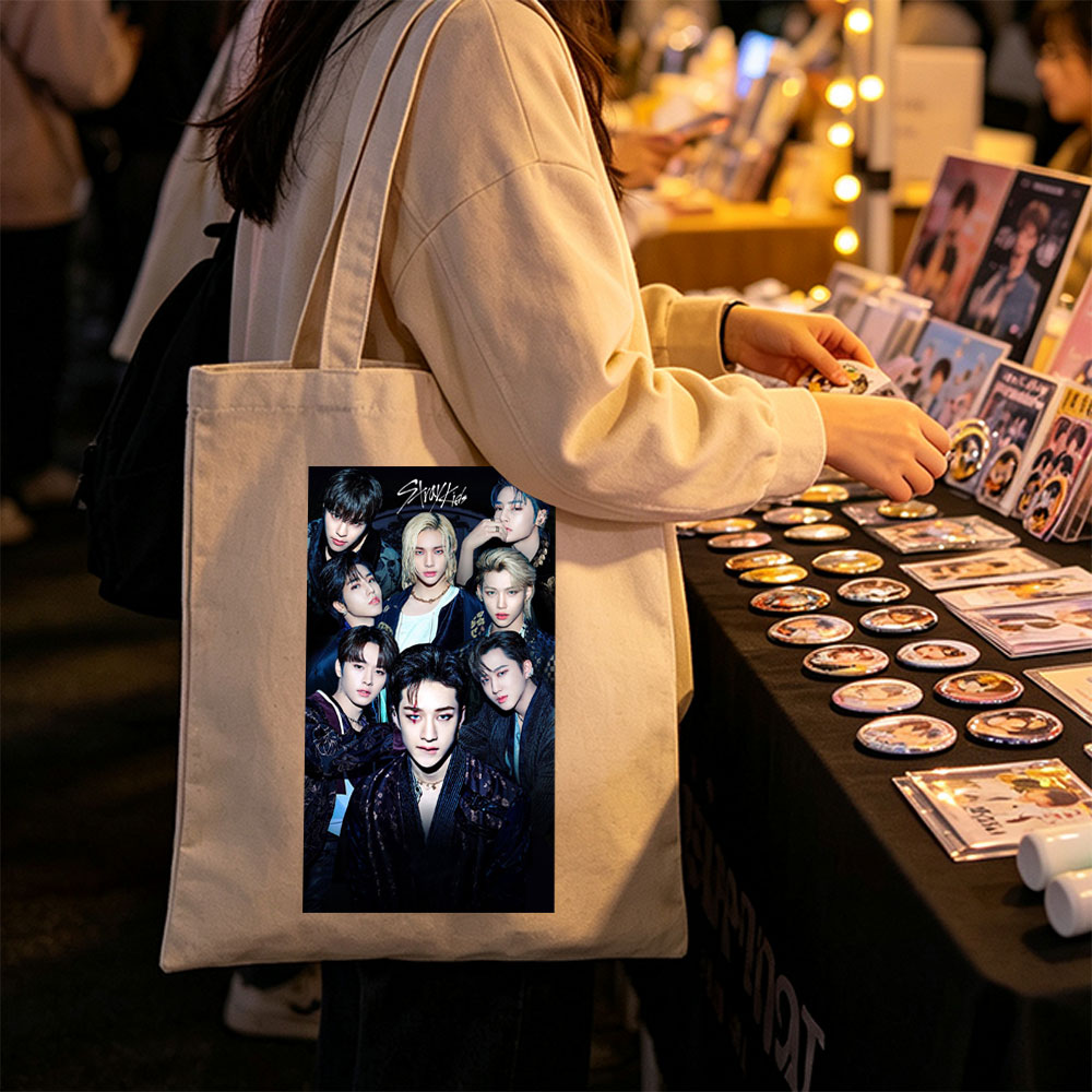 Stray Kids Group Portrait in Dark Elegant Attire with Intense Expressions - Canvas tote bags