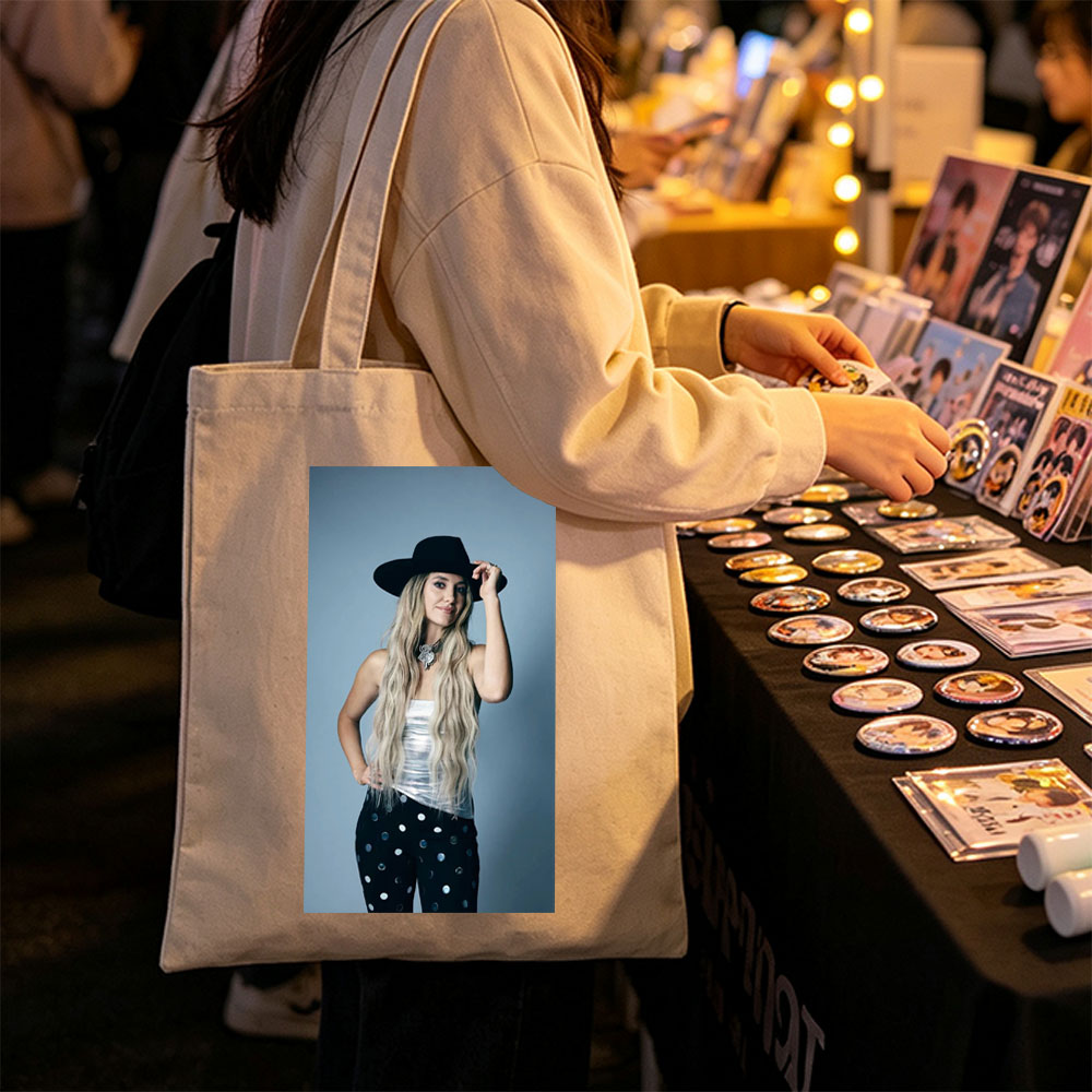 Shania Twain in a Stylish Pose Wearing a Black Hat and Polka Dot Pants - Canvas tote bags